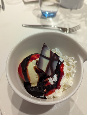 Vanilla ice cream with strawberry coulis & chocolate sauce